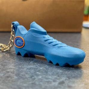 Blue shoe-shaped keychain.